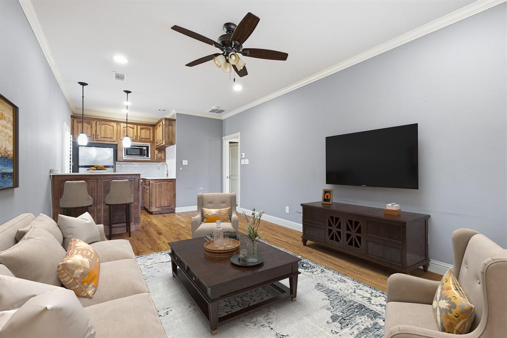 2201 Mockingbird Lane Flower Mound, TX 75022 - Photo 30 of 40 a living room with furniture and a flat screen tv
