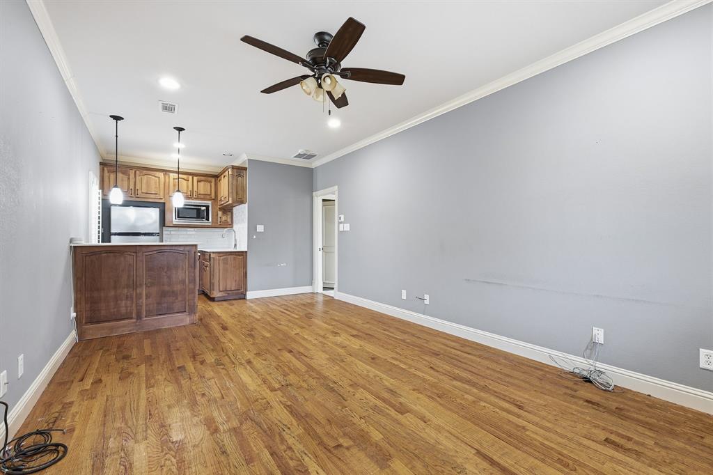 2201 Mockingbird Lane Flower Mound, TX 75022 - Photo 31 of 40 a view of a kitchen with a sink and a window