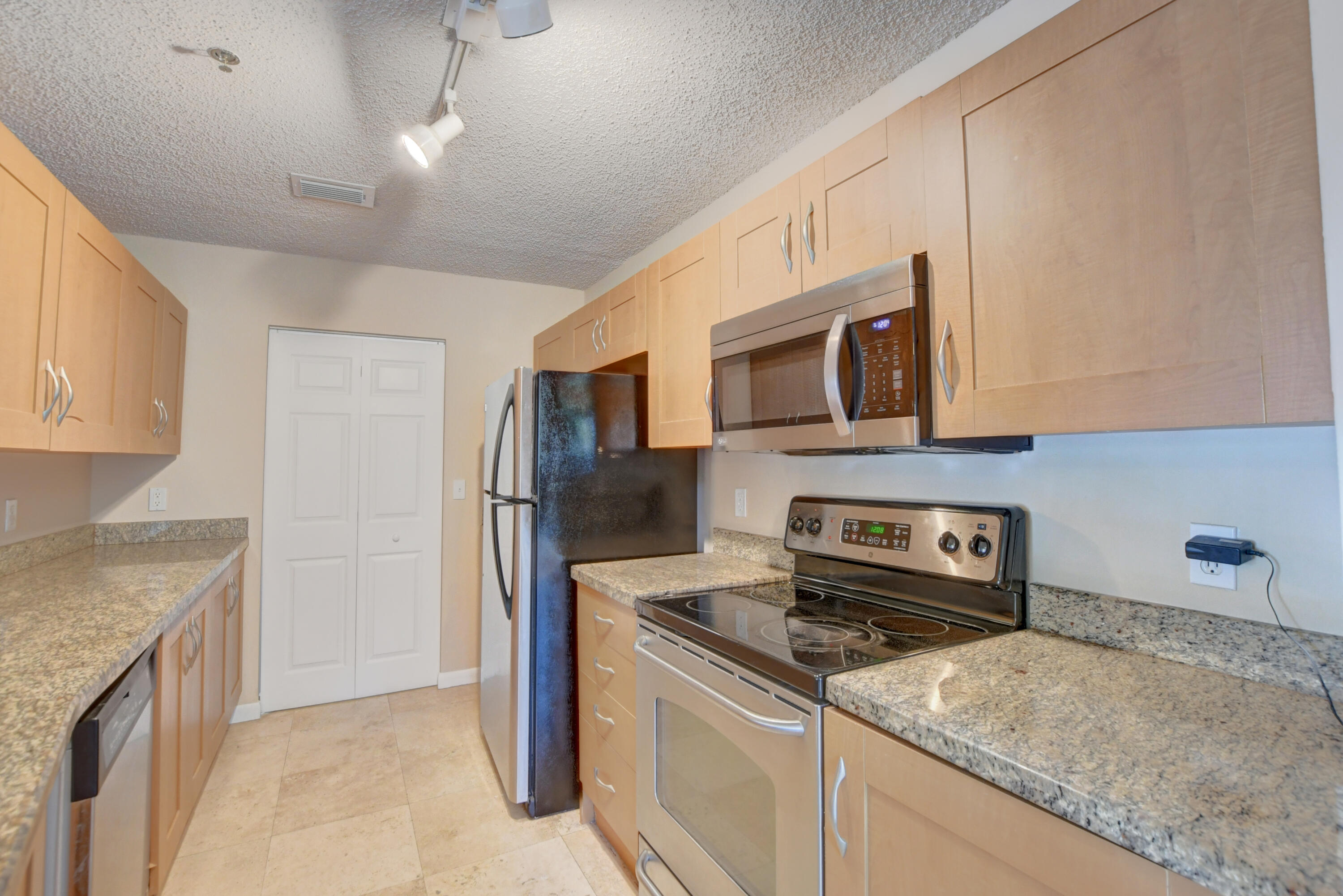 3111 Clint Moore Road, Unit 207 Boca Raton, FL 33496 - Photo 10 of 39 Door to laundry closet