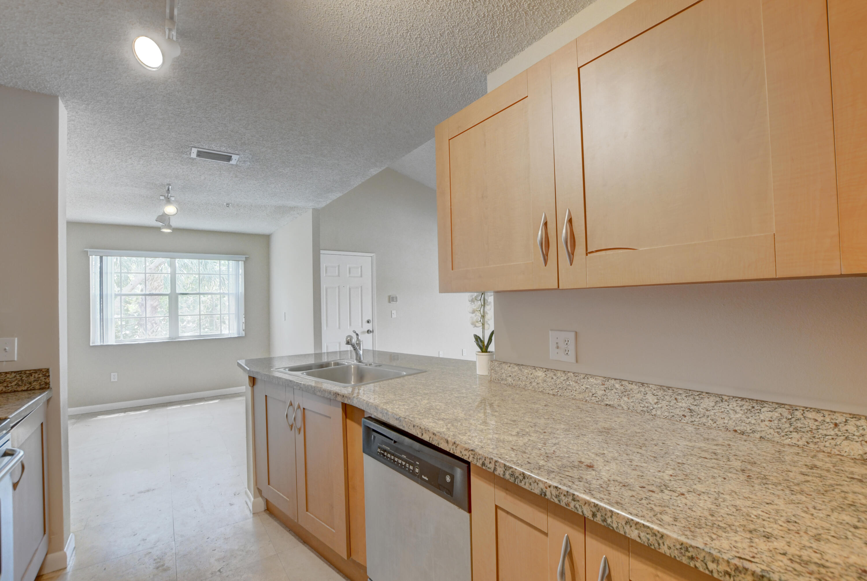 3111 Clint Moore Road, Unit 207 Boca Raton, FL 33496 - Photo 13 of 39 Flows to Dining Area