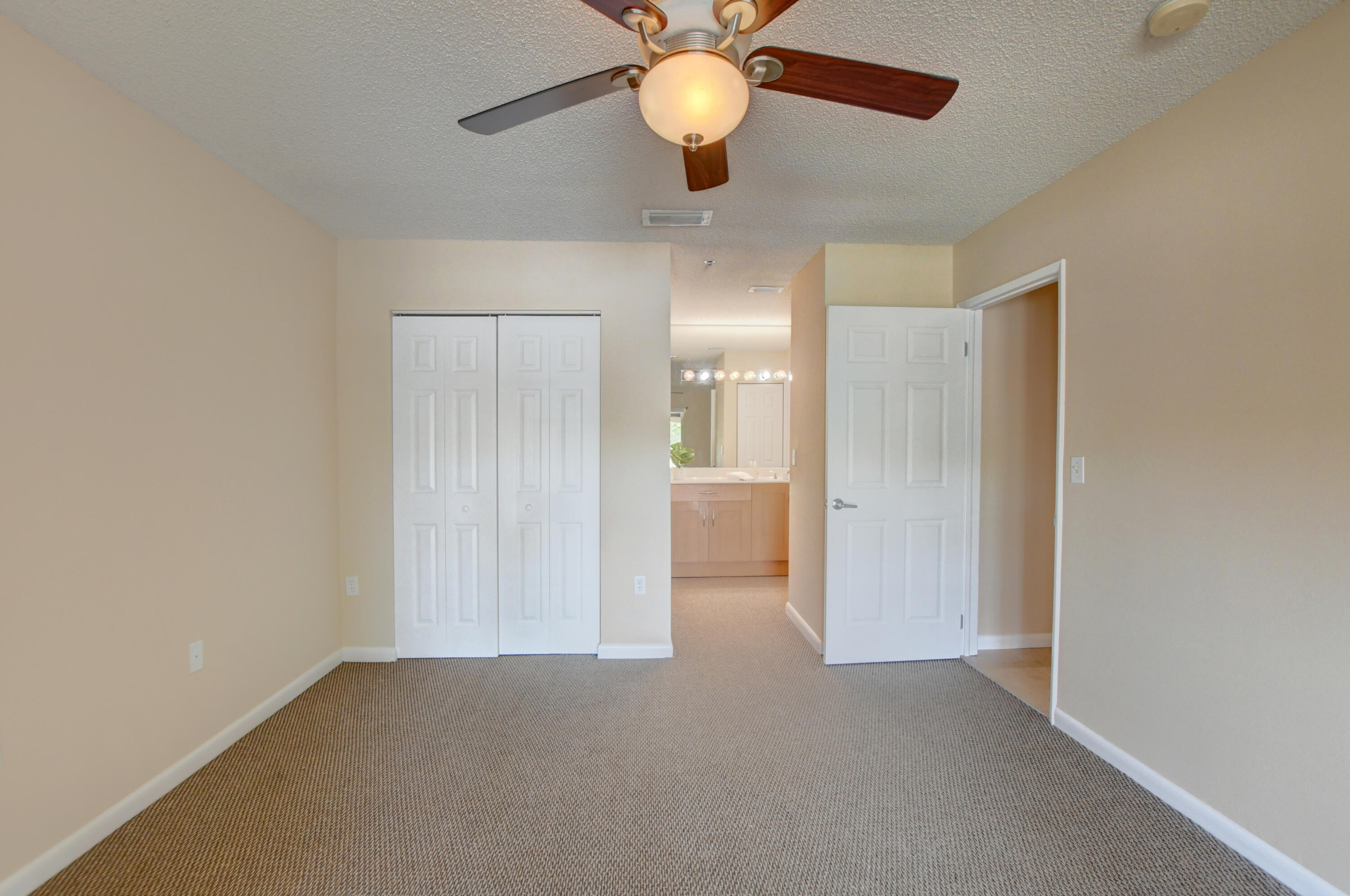 3111 Clint Moore Road, Unit 207 Boca Raton, FL 33496 - Photo 20 of 39 Owners Suite with one of two closets