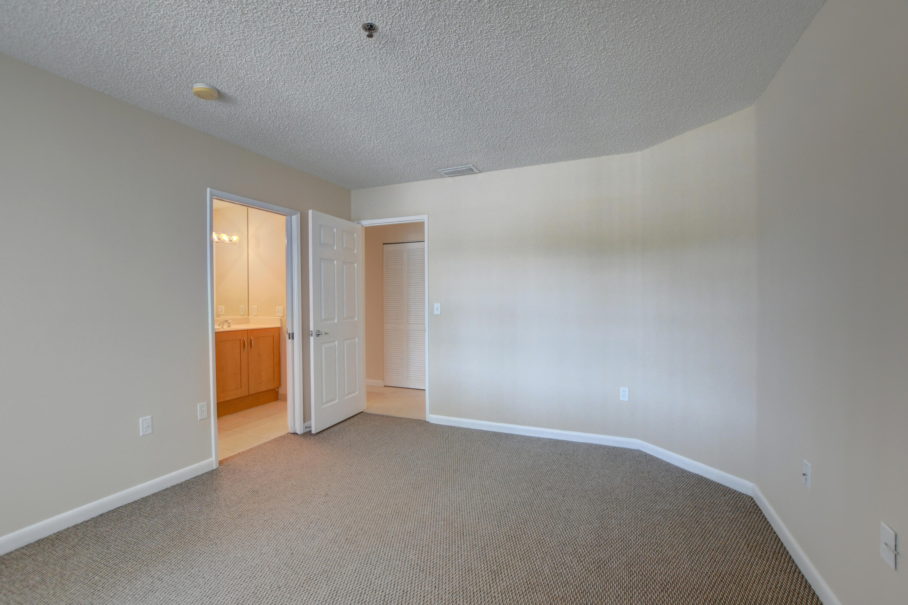 3111 Clint Moore Road, Unit 207 Boca Raton, FL 33496 - Photo 27 of 39 Guest Room with En Suite Bath