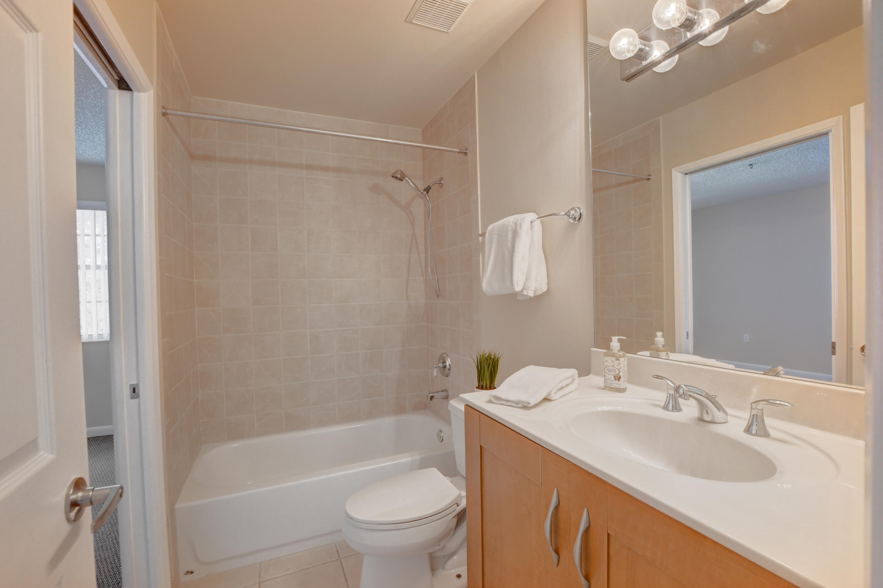 3111 Clint Moore Road, Unit 207 Boca Raton, FL 33496 - Photo 29 of 39 Guest Bath with 2 entrances
