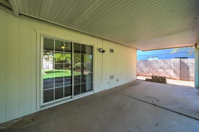 a view of a room with a large window