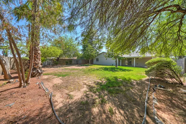 a view of a house with a big yard
