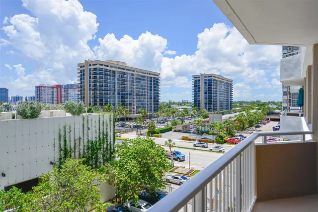 a view of a city with tall buildings