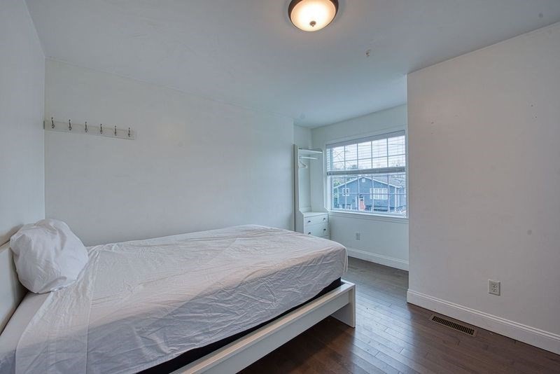 438 Smith Street Fall River, MA 02721 - Photo 25 of 31 a bedroom with a bed and a window