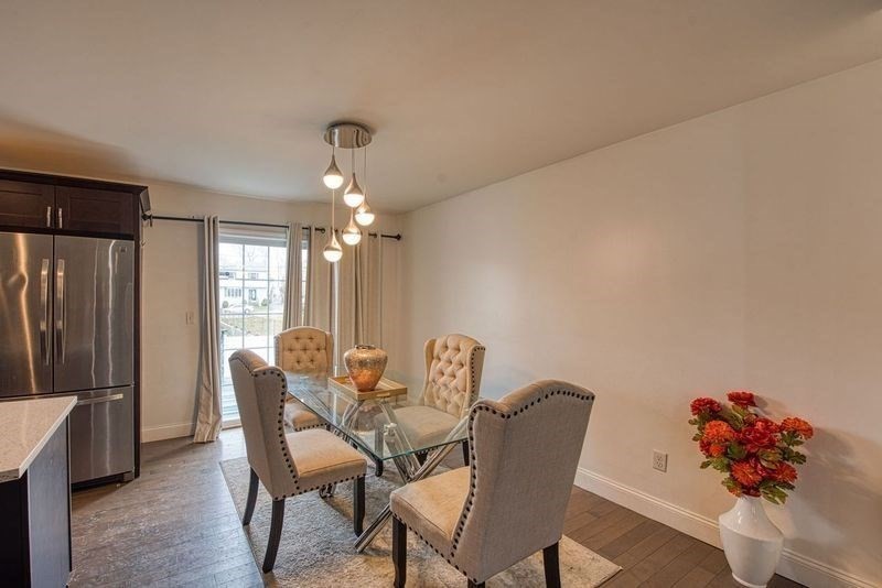 438 Smith Street Fall River, MA 02721 - Photo 9 of 31 a dining room with furniture and window