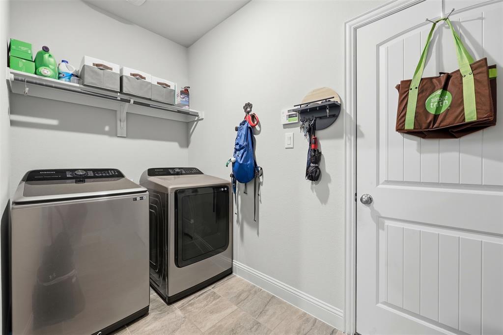 418 Crestview Drive Midlothian, TX 76065 - Photo 31 of 39 a utility room with dryer and washer