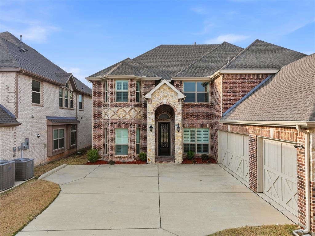 418 Crestview Drive Midlothian, TX 76065 - Photo 4 of 39 a front view of a house with a yard