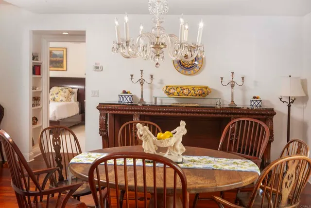 a view of a livingroom with furniture and a window