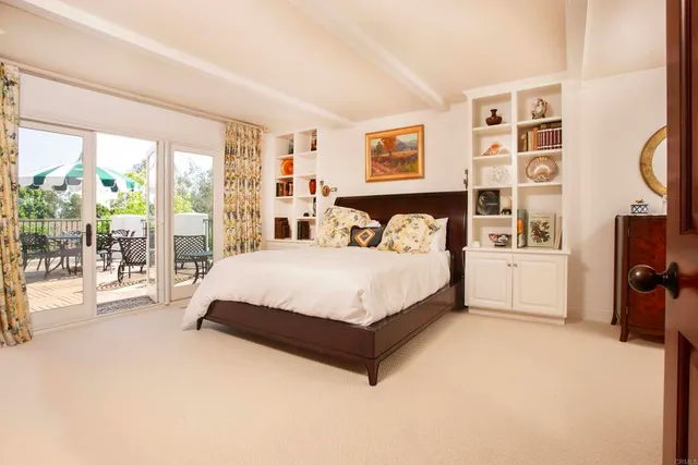 a bathroom with a double vanity sink mirror and