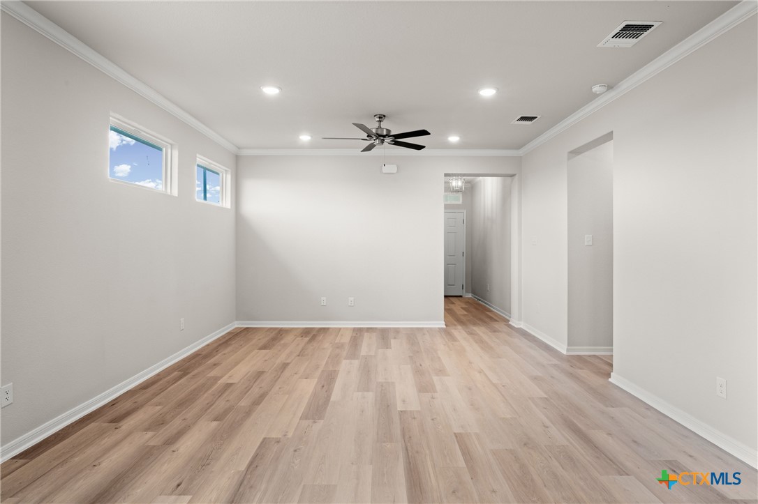 8024 Pineridge Way Temple, TX 76502 - Photo 9 of 32 wooden floor in an empty room with a window