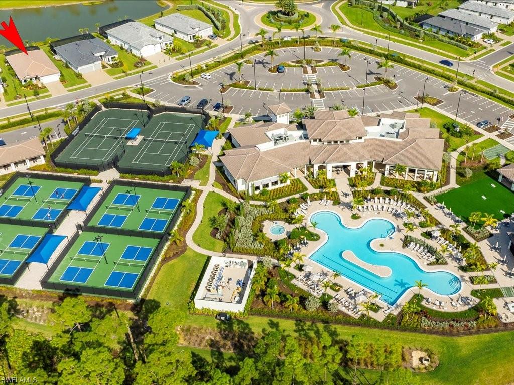 1937 Don Benito Way Naples, FL 34120 - Photo 26 of 27 Aerial view of residential area with a pool and a nearby body of water