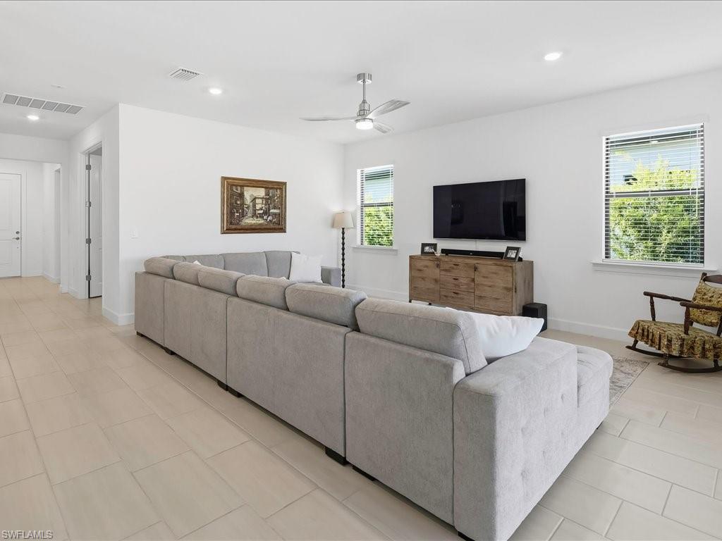 1937 Don Benito Way Naples, FL 34120 - Photo 5 of 27 Living room with recessed lighting, a ceiling fan, and light tile patterned floors