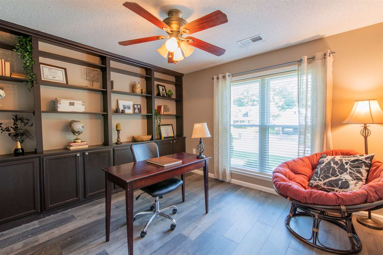 7758 Grey Squirrel Cove Memphis, TN 38018 - Photo 18 of 22 This bedroom features custom built ins and is currently used as a home office.