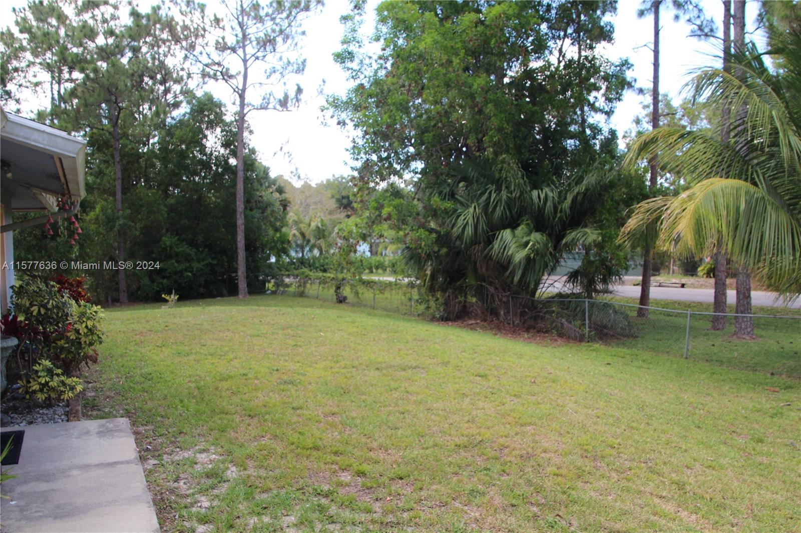 12646 55th Road North West Palm Beach, FL 33411 - Photo 6 of 10 a view of outdoor space with trees