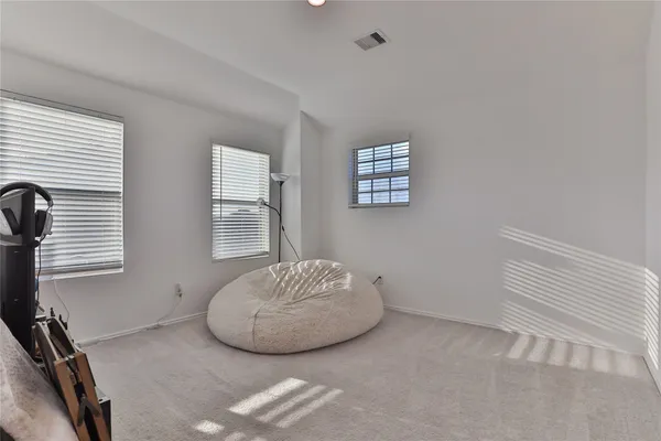 a view of a room that has a window