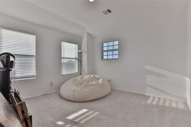 a view of a room that has a window