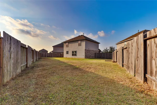 a bathroom with a sink and a yard