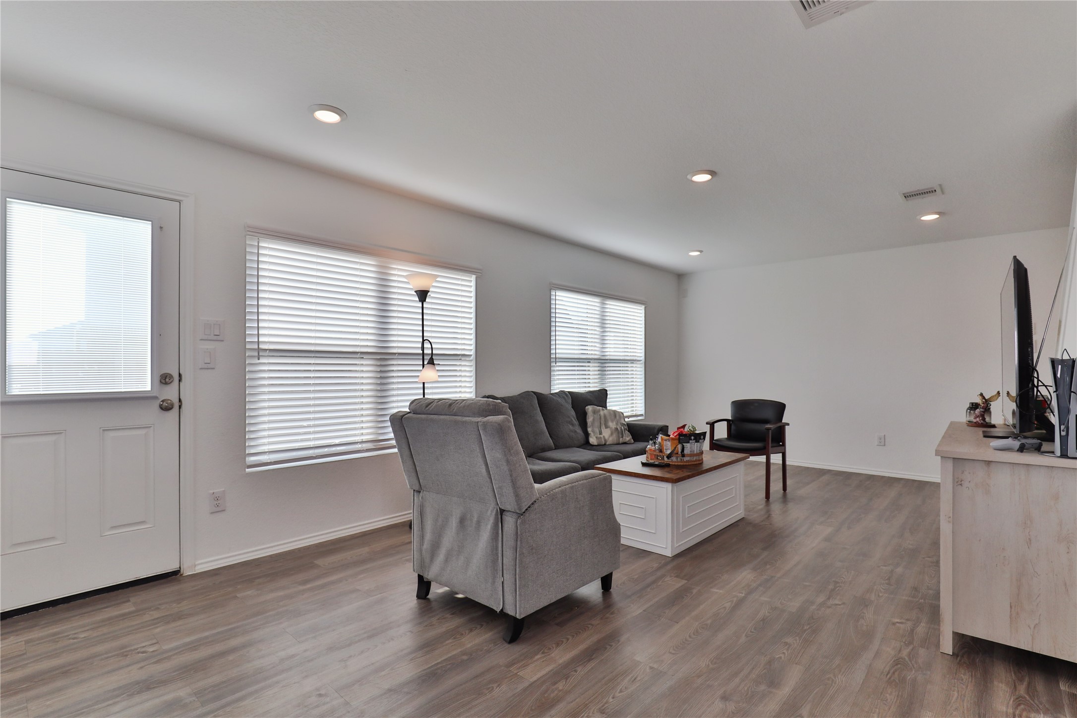 184 Kelly Street Angleton, TX 77515 - Photo 7 of 29 a living room with furniture window and wooden floor