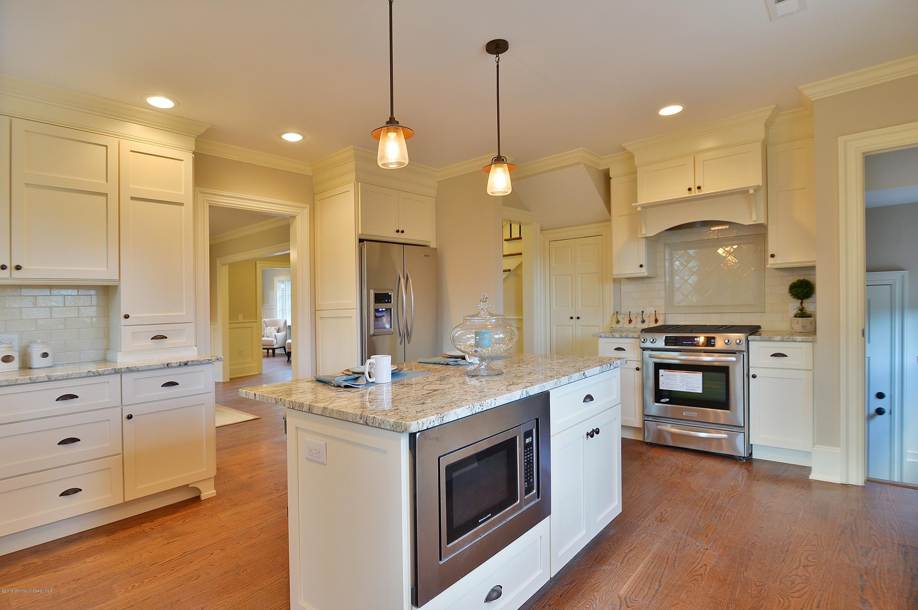 38 Silverside Avenue Little Silver, NJ 07739 - Photo 14 of 36 a kitchen with a stove and a sink