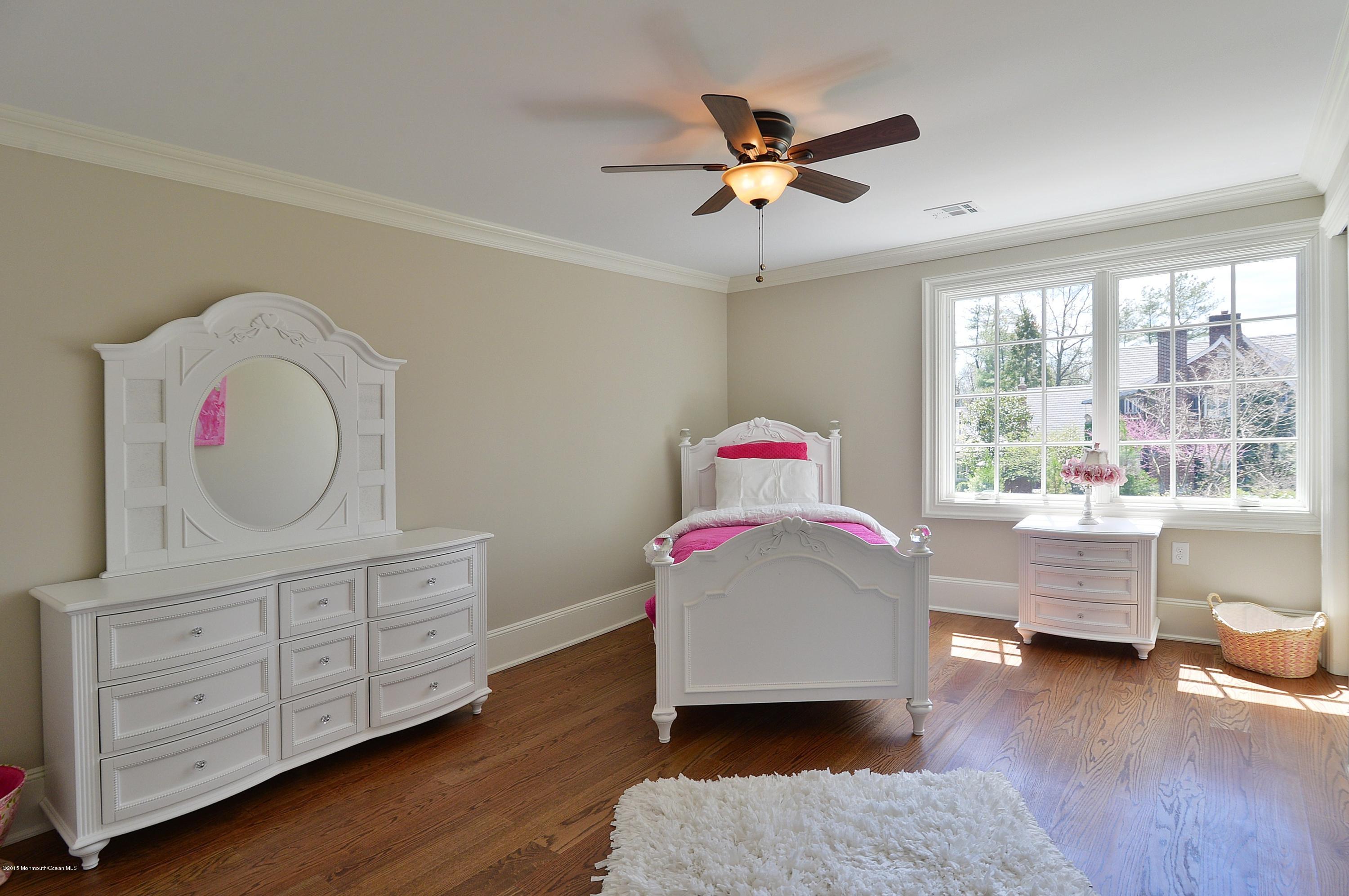 38 Silverside Avenue Little Silver, NJ 07739 - Photo 26 of 36 a bedroom with furniture and a window