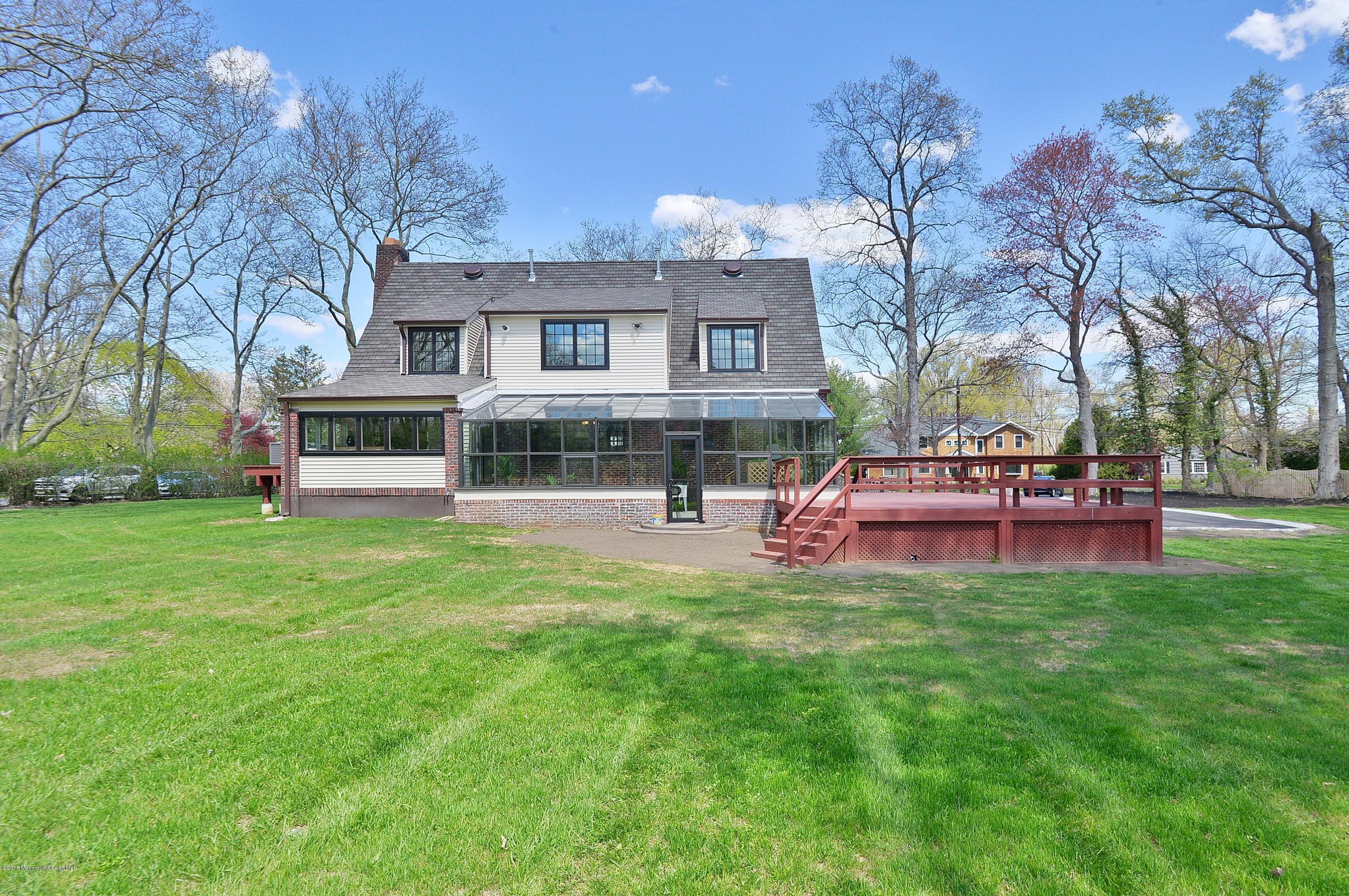 38 Silverside Avenue Little Silver, NJ 07739 - Photo 31 of 36 a view of a house with a yard porch and sitting area