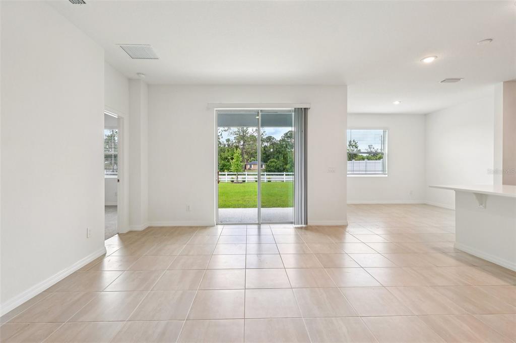 1756 Columbus Path St. Cloud, FL 34771 - Photo 15 of 37 a view of an empty room with a window