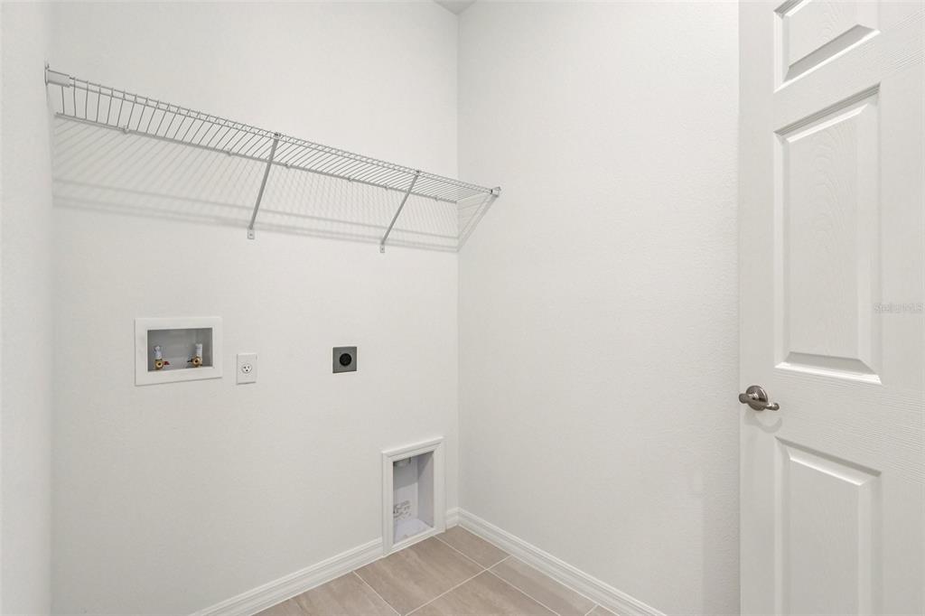 1756 Columbus Path St. Cloud, FL 34771 - Photo 18 of 37 a view of a storage & utility room