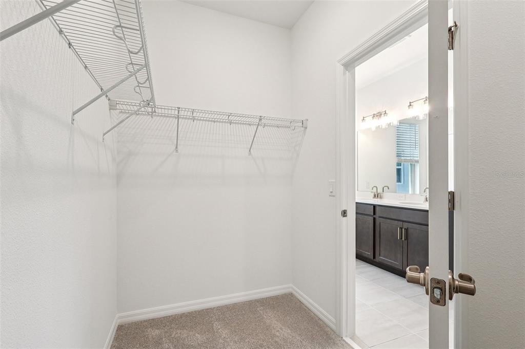 1756 Columbus Path St. Cloud, FL 34771 - Photo 25 of 37 a view of a bathroom from a hallway