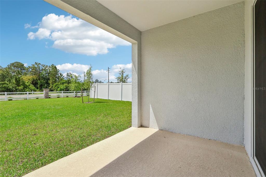 1756 Columbus Path St. Cloud, FL 34771 - Photo 27 of 37 a view of a green field