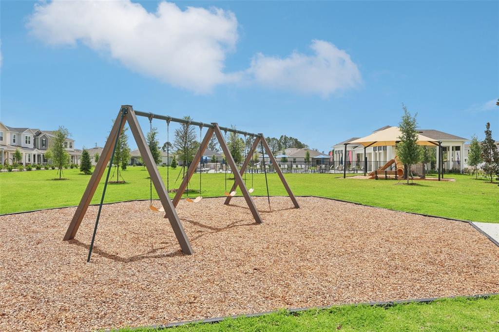 1756 Columbus Path St. Cloud, FL 34771 - Photo 33 of 37 a view of a park with a slide