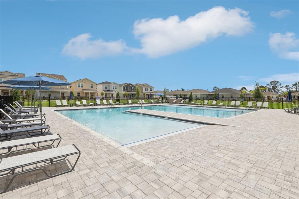 1756 Columbus Path St. Cloud, FL 34771 - Photo 35 of 37 a view of a lake with a terrace