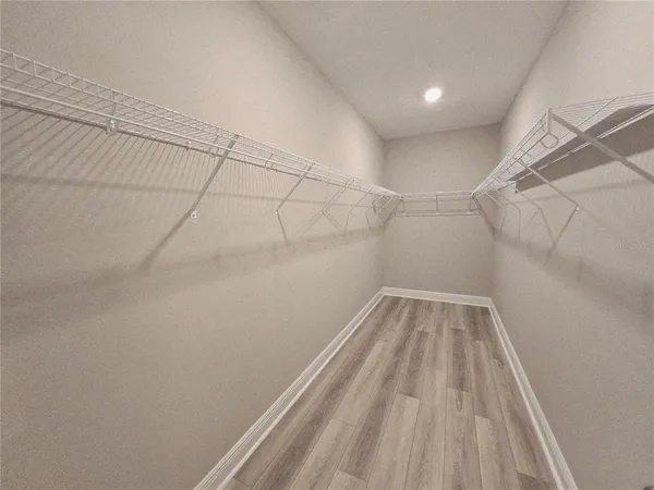 a view of a room with racks on the wall