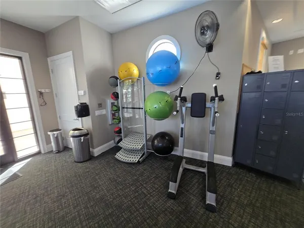 a view of a room with gym equipment