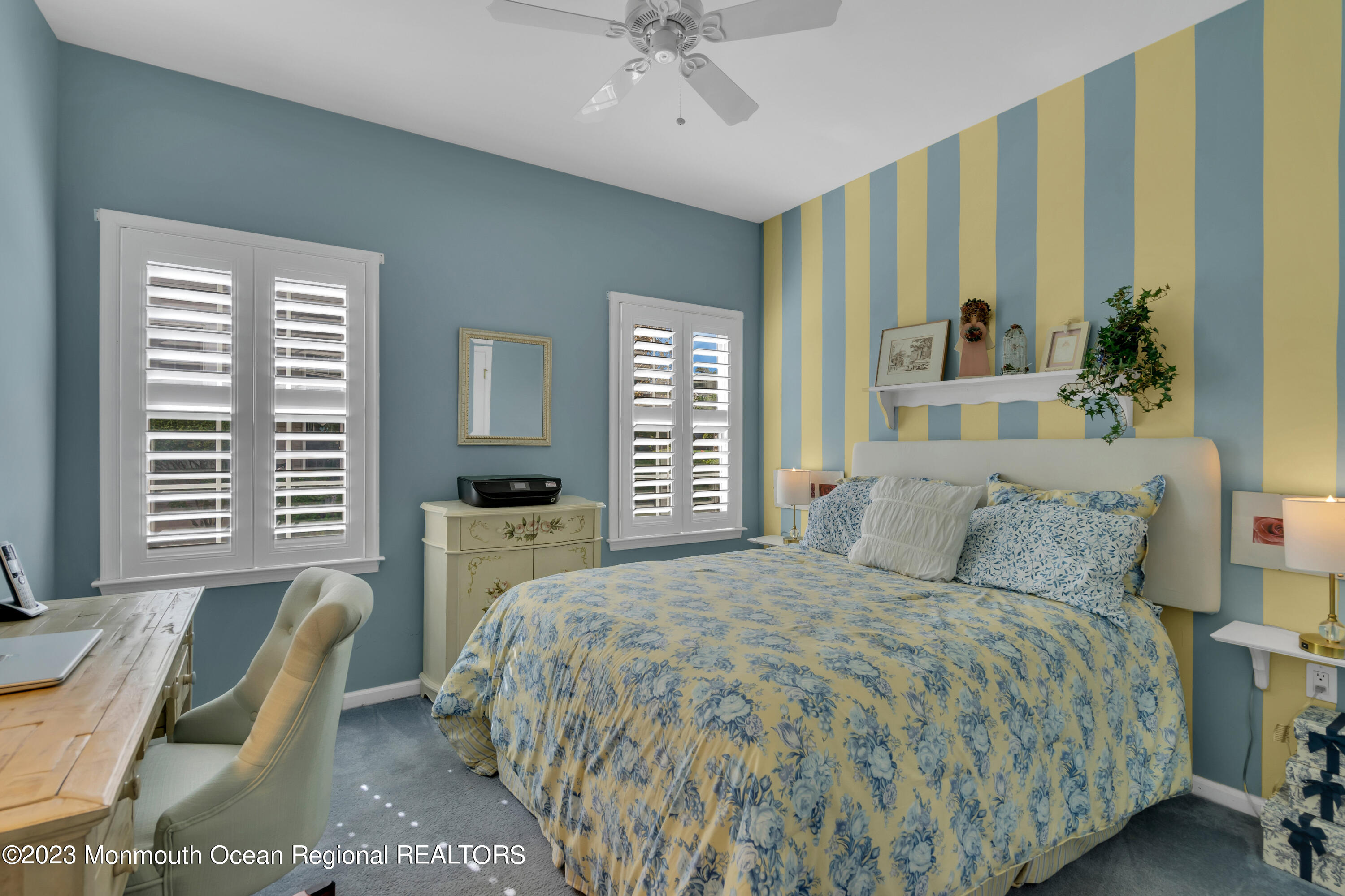92 Pancoast Road Waretown, NJ 08758 - Photo 24 of 50 a bedroom with a bed and a chandelier