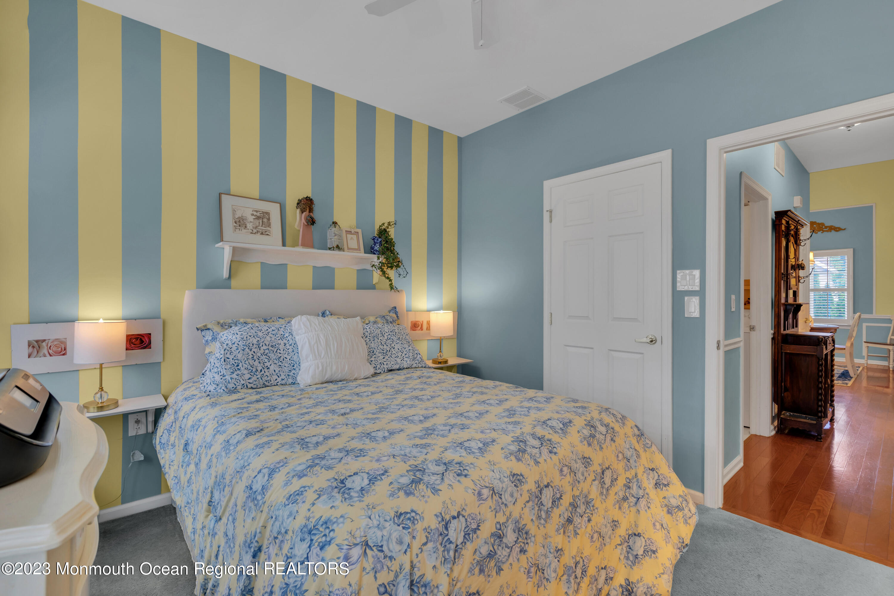 92 Pancoast Road Waretown, NJ 08758 - Photo 25 of 50 a bedroom with a bed and a wooden floor