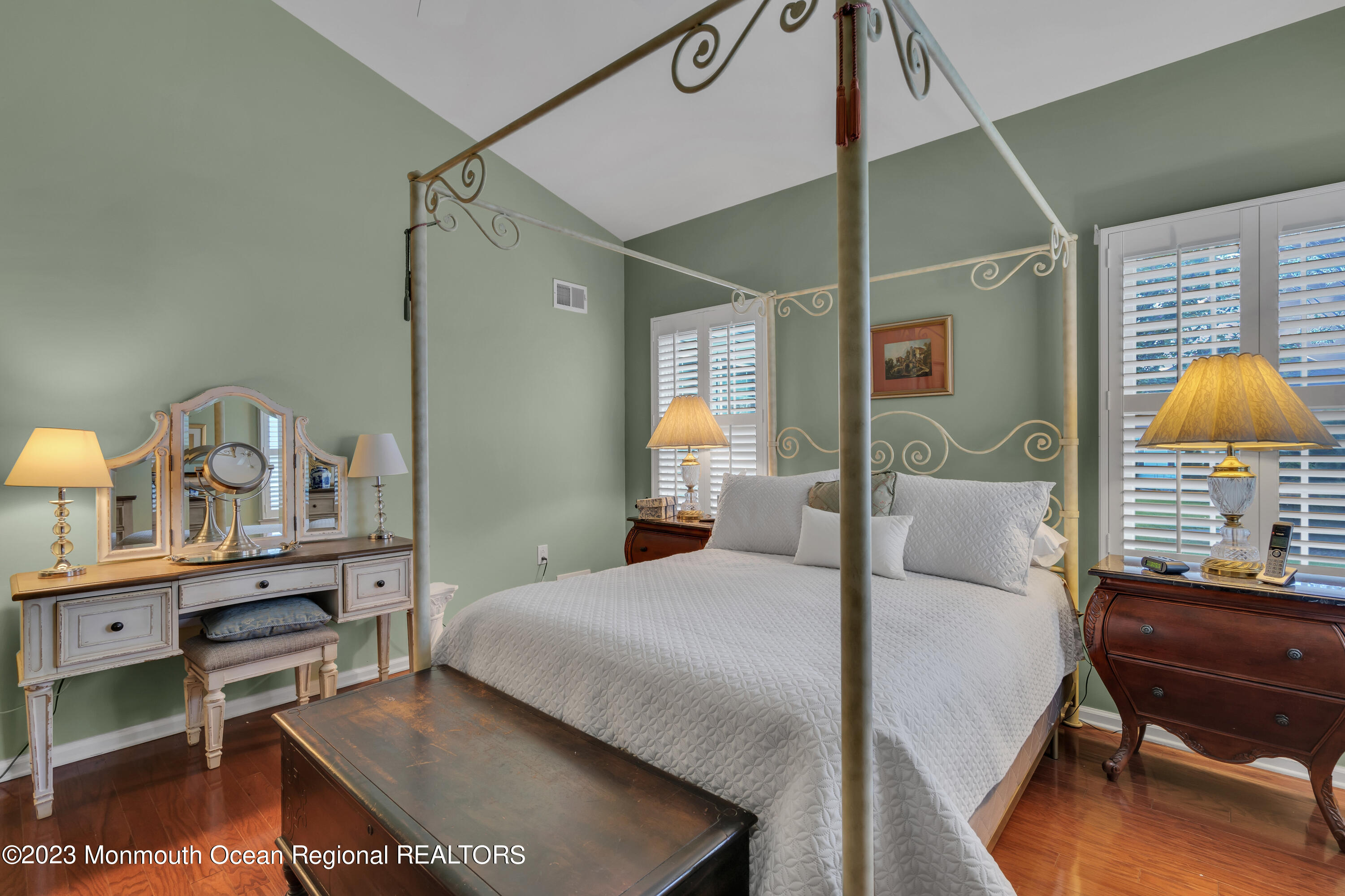 92 Pancoast Road Waretown, NJ 08758 - Photo 27 of 50 a bedroom with a bed a table and painting on the wall