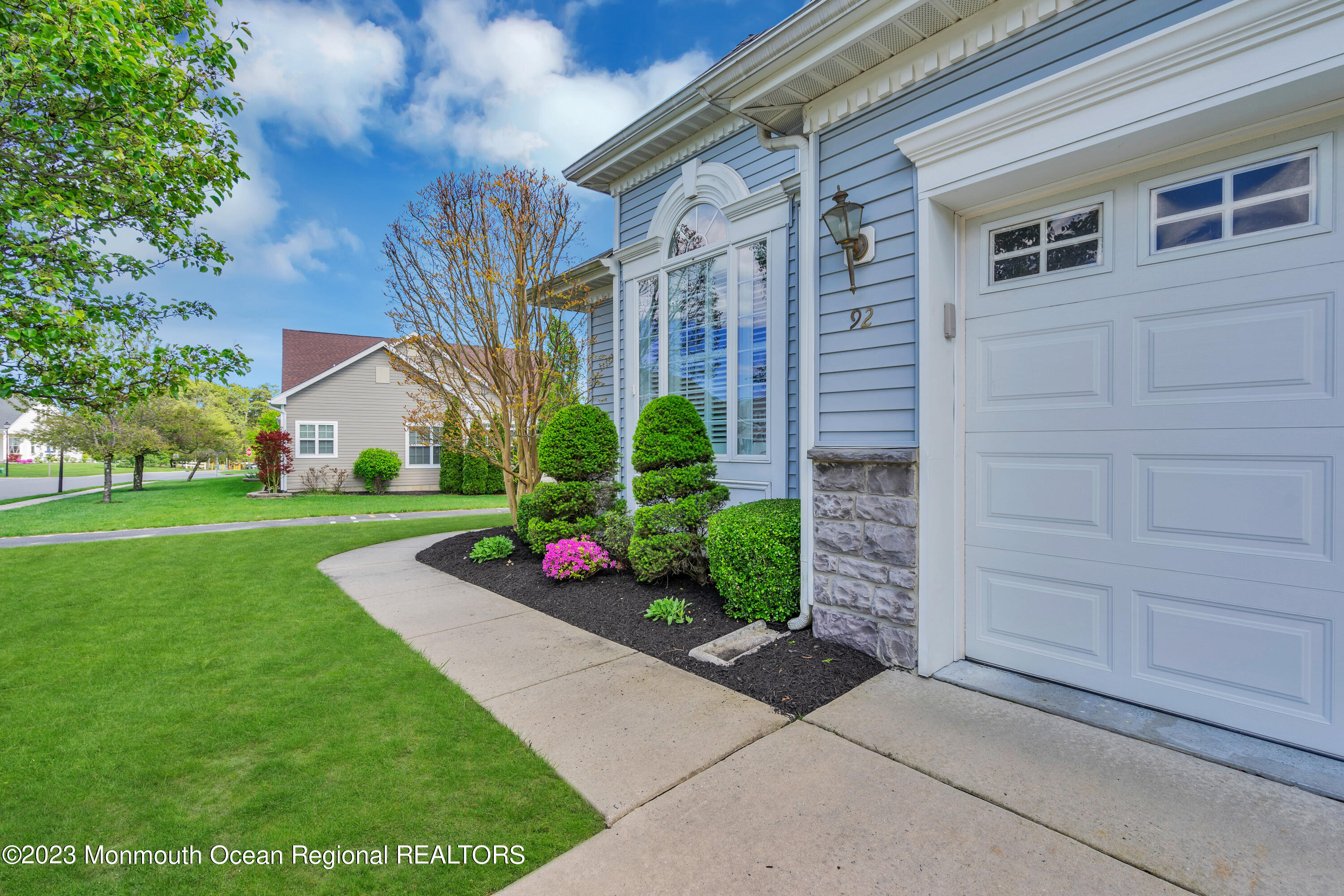 92 Pancoast Road Waretown, NJ 08758 - Photo 4 of 50 a front view of a house with garden