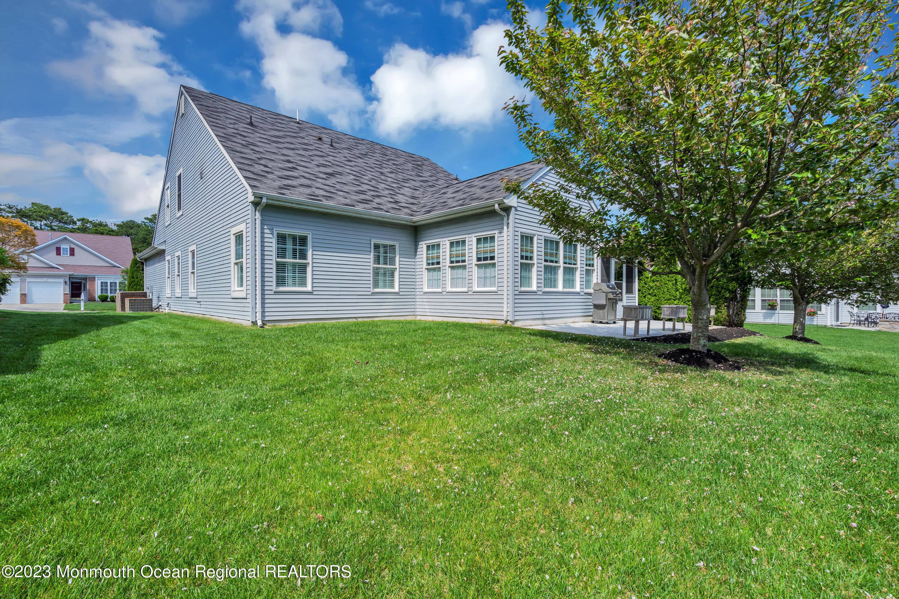 92 Pancoast Road Waretown, NJ 08758 - Photo 42 of 50 a front view of house with yard and green space