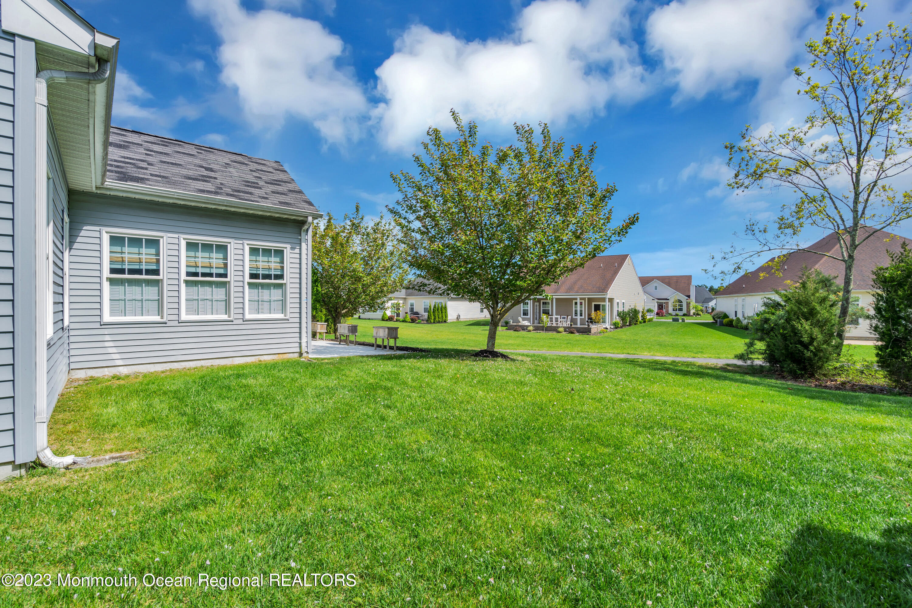 92 Pancoast Road Waretown, NJ 08758 - Photo 43 of 50 a view of a house with backyard and a tree