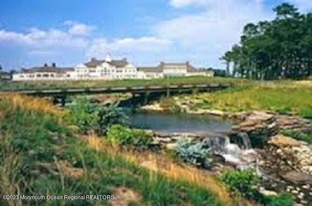 92 Pancoast Road Waretown, NJ 08758 - Photo 46 of 50 a view of a lake with a city