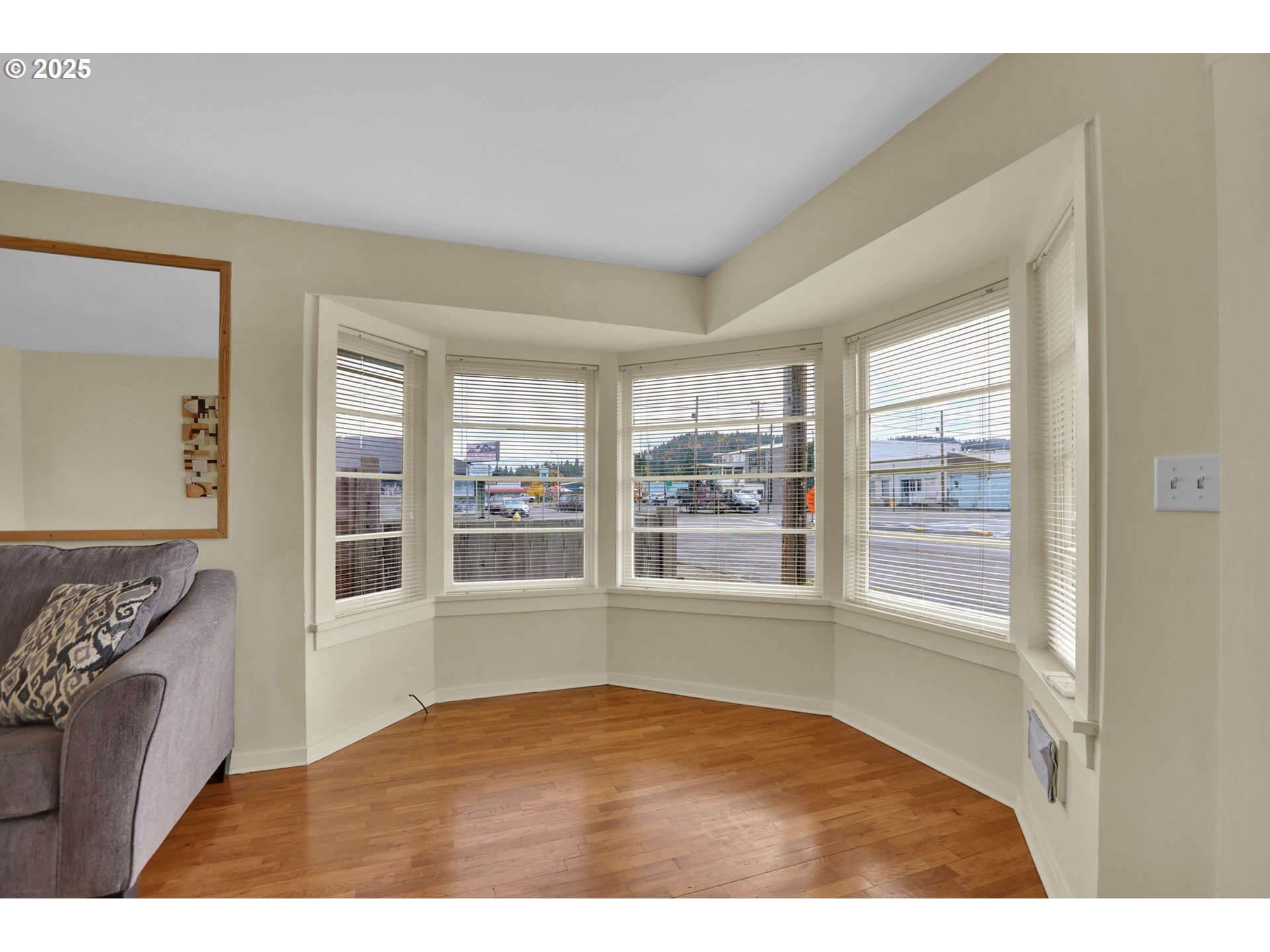 728 East Whiteaker Avenue Cottage Grove, OR 97424 - Photo 7 of 38 a view of an empty room with a window