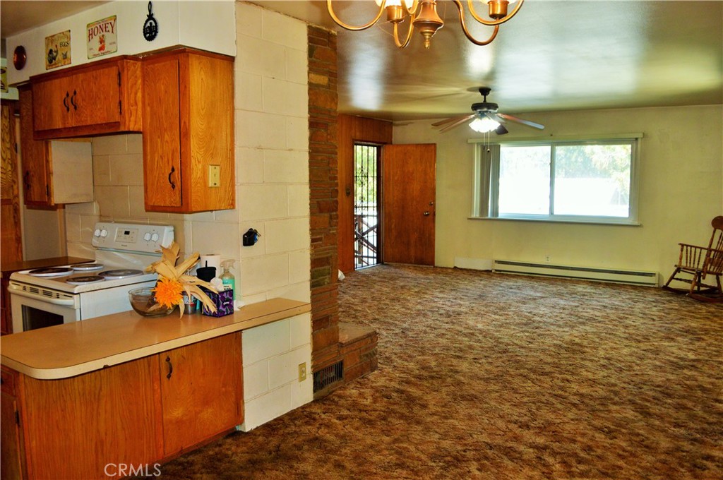 53337 Tollgate Road Idyllwild, CA 92549 - Photo 14 of 30 a kitchen with a sink appliances and cabinets