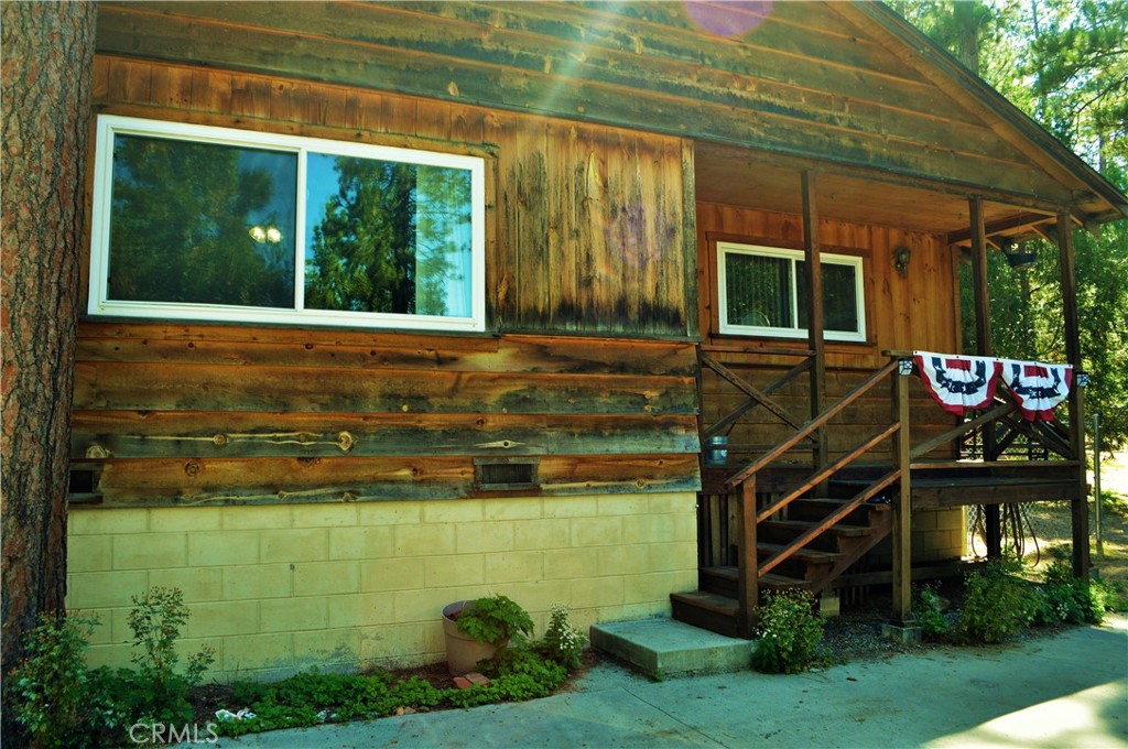 53337 Tollgate Road Idyllwild, CA 92549 - Photo 23 of 30 a front view of a house with garden