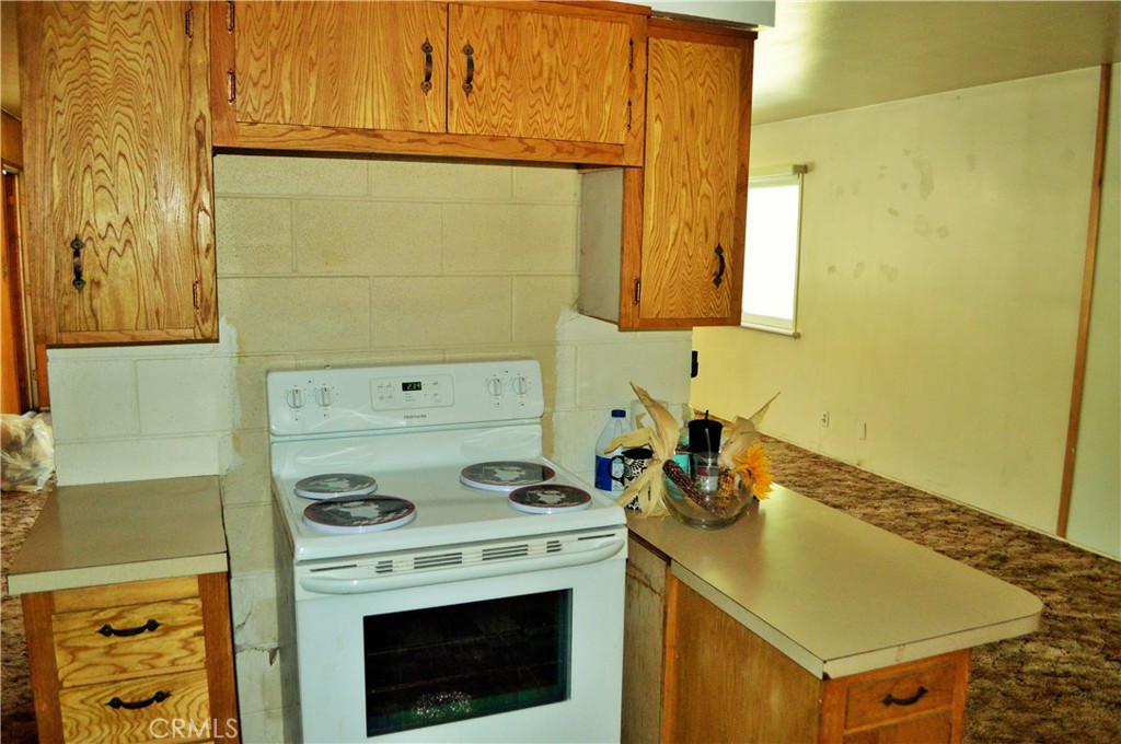 53337 Tollgate Road Idyllwild, CA 92549 - Photo 4 of 30 a view of a storage and utility room with washer and dryer