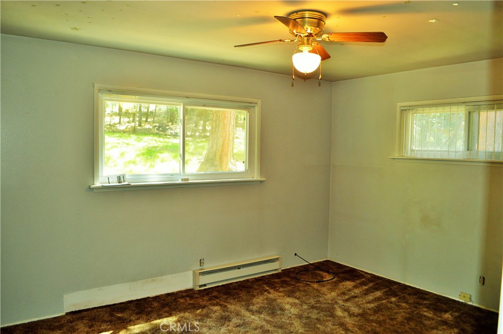 53337 Tollgate Road Idyllwild, CA 92549 - Photo 10 of 30 a view of a room with window and ceiling fan