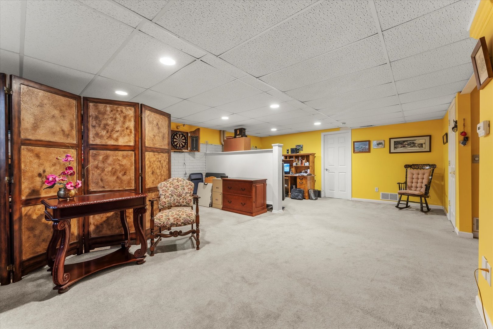 1706 Tin Cup Road, Unit 1706 Mahomet, IL 61853 - Photo 33 of 43 a view of an empty room with furniture and a window