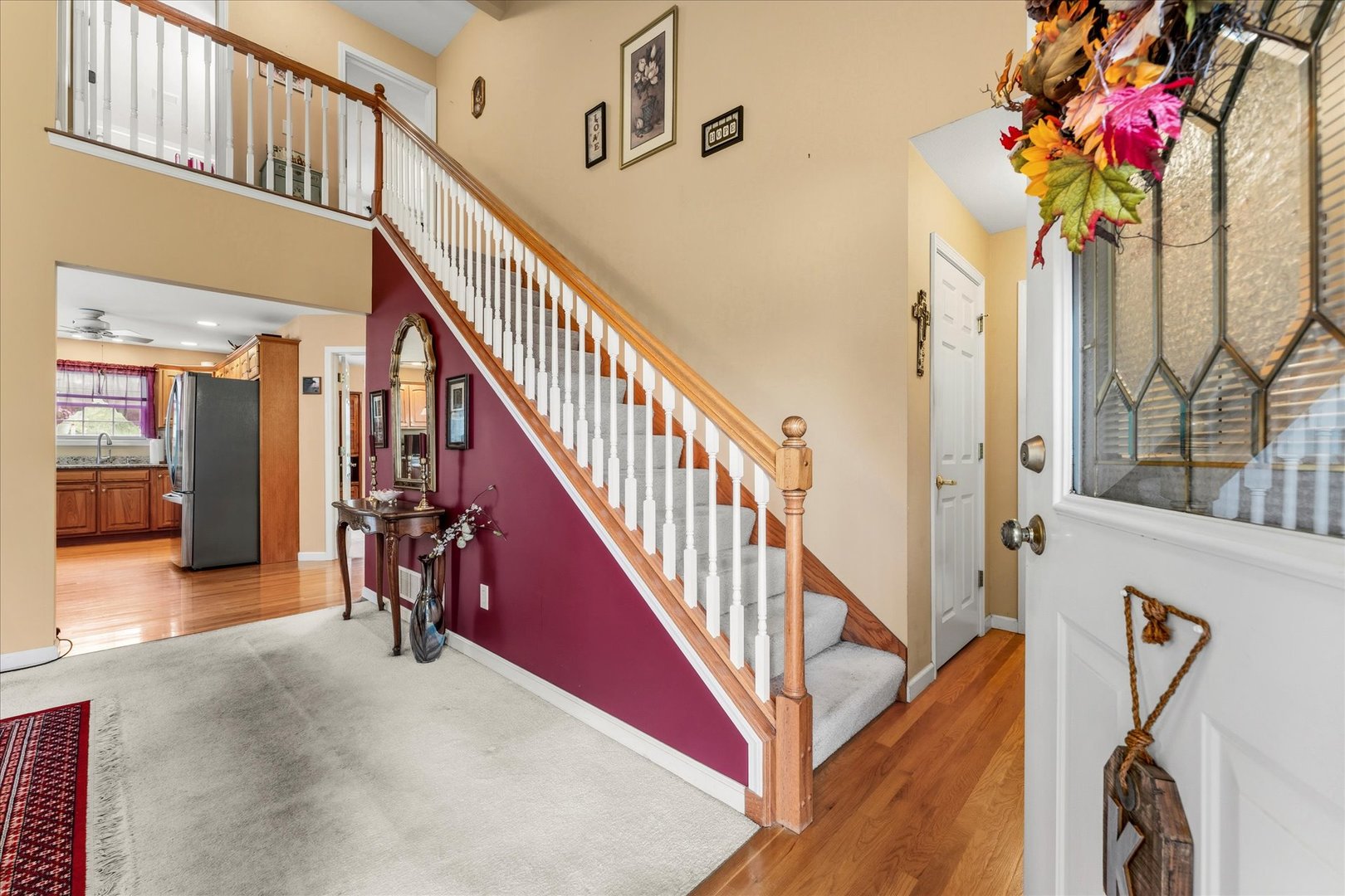 1706 Tin Cup Road, Unit 1706 Mahomet, IL 61853 - Photo 5 of 43 a view of entryway and hall with wooden floor